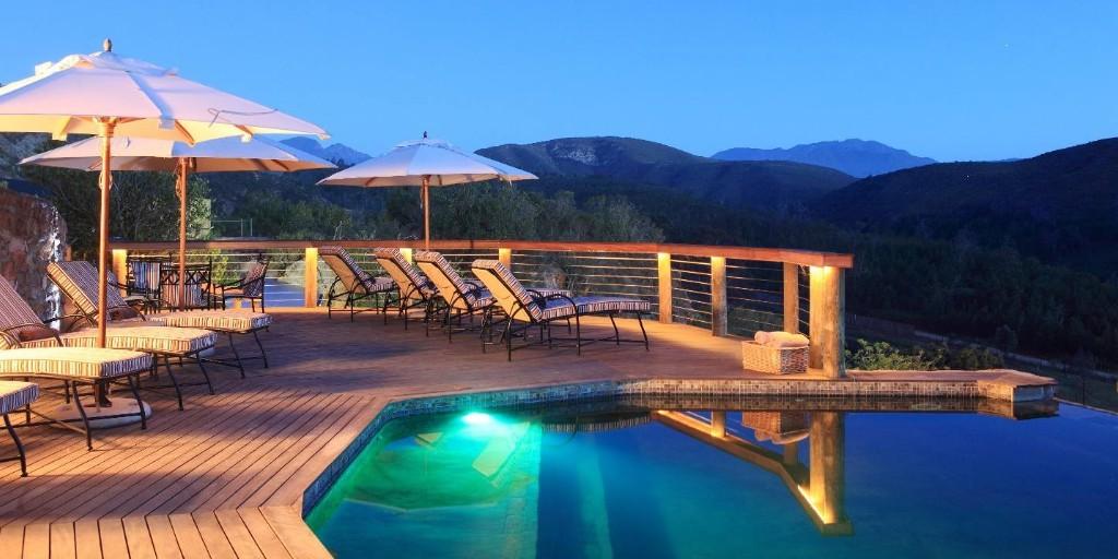 Panoramic bush views can be enjoyed from the pool deck at Botlierskop Lodge